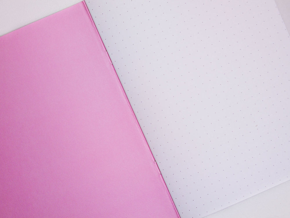 The Completist pink animal print notebook