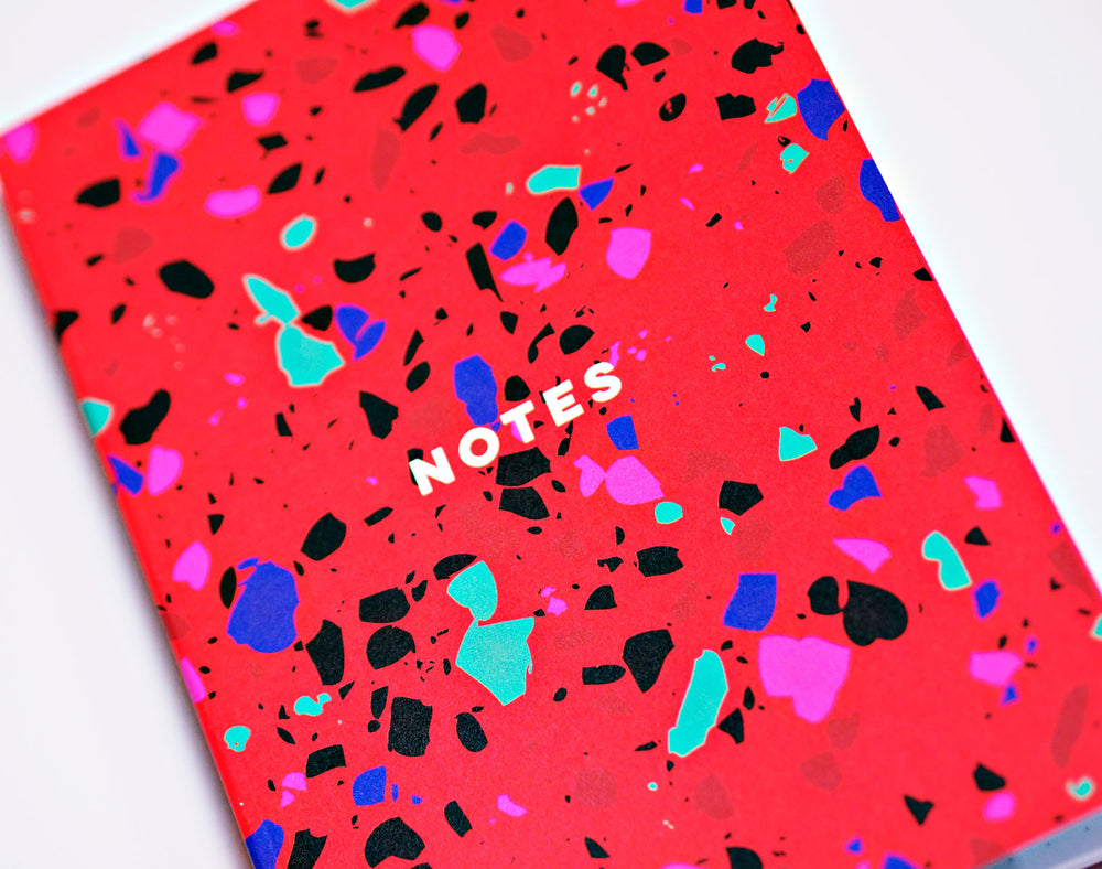 The Completist red terrazzo notebook
